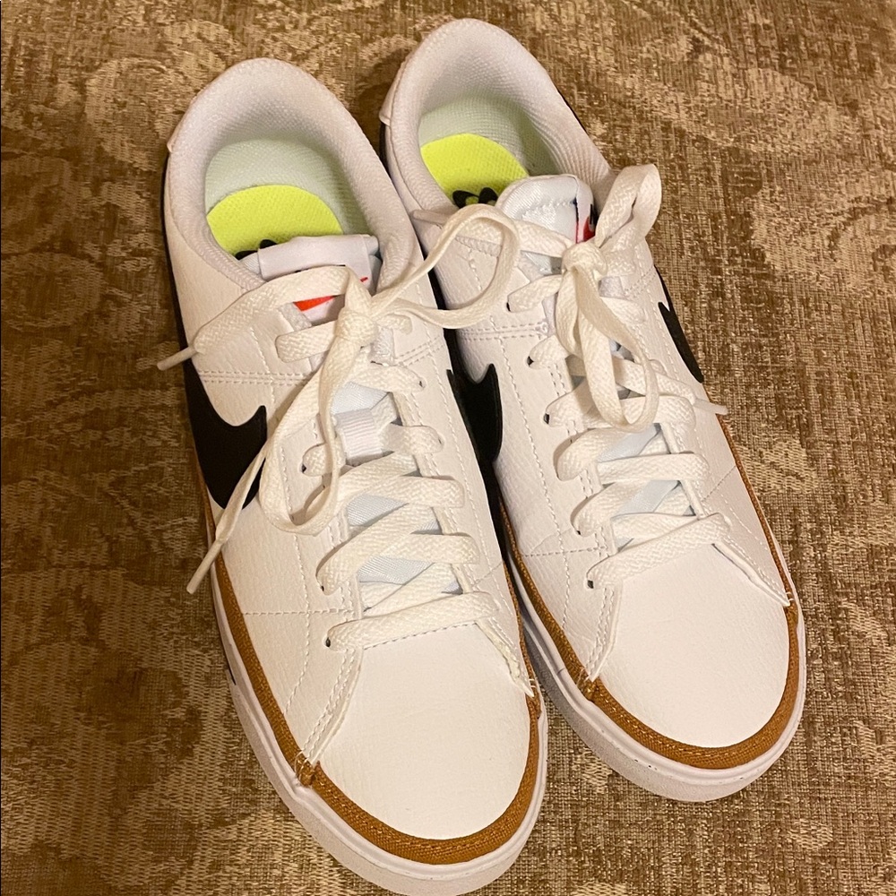 Nike white  Sneakers with Black Swoosh and Brown Accents